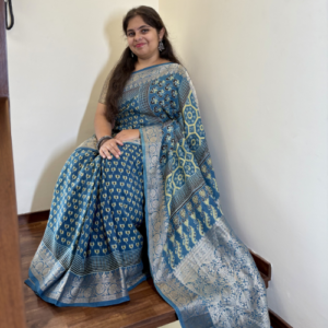 Turquoise Blue Ajrakh Modal Silk Saree with Zari Border
